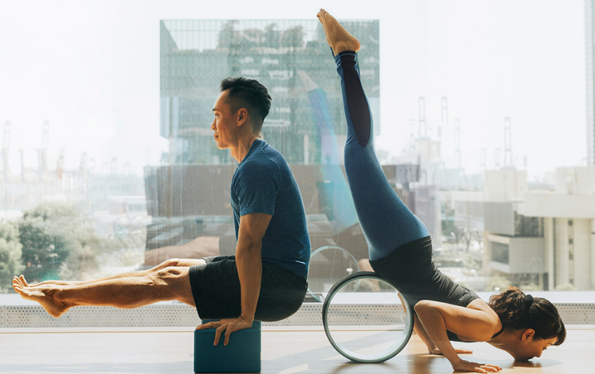 PURE yoga instructors doing yoga poses