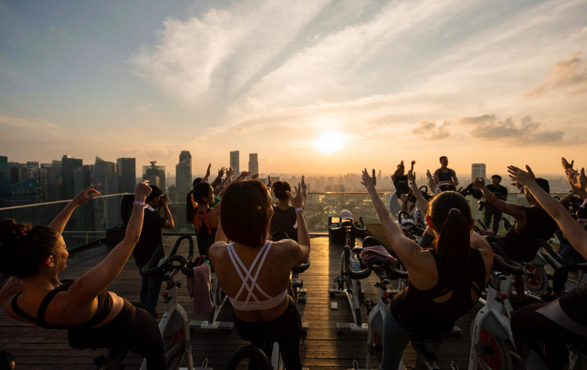 CruCycle outdoor spin class held at sunset