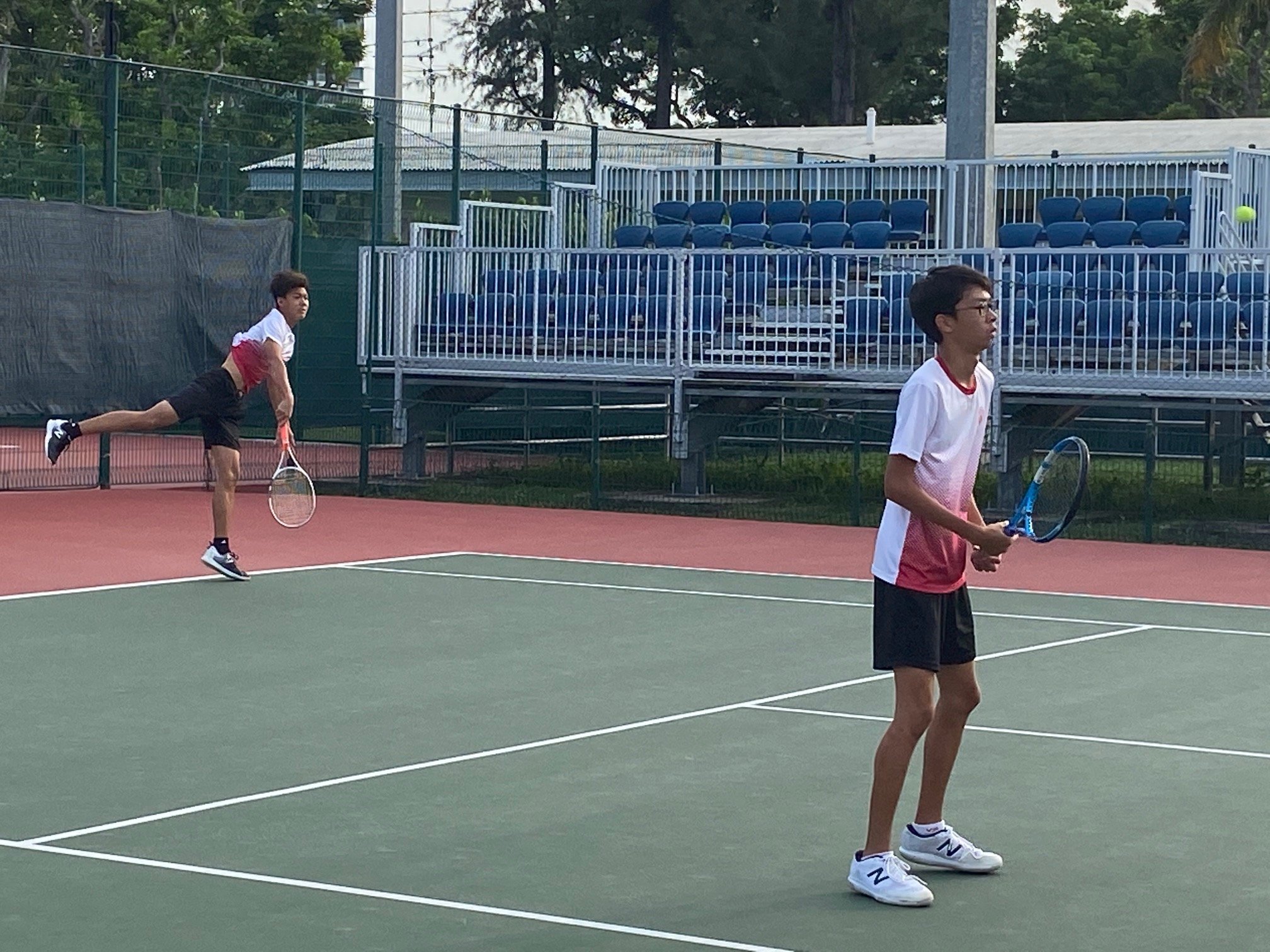 NSG B Div boys tennis - Victoria Schools doubles pair of Aiden Raphael Keh and Leonard Yew in action at Kallang Tennis Centre