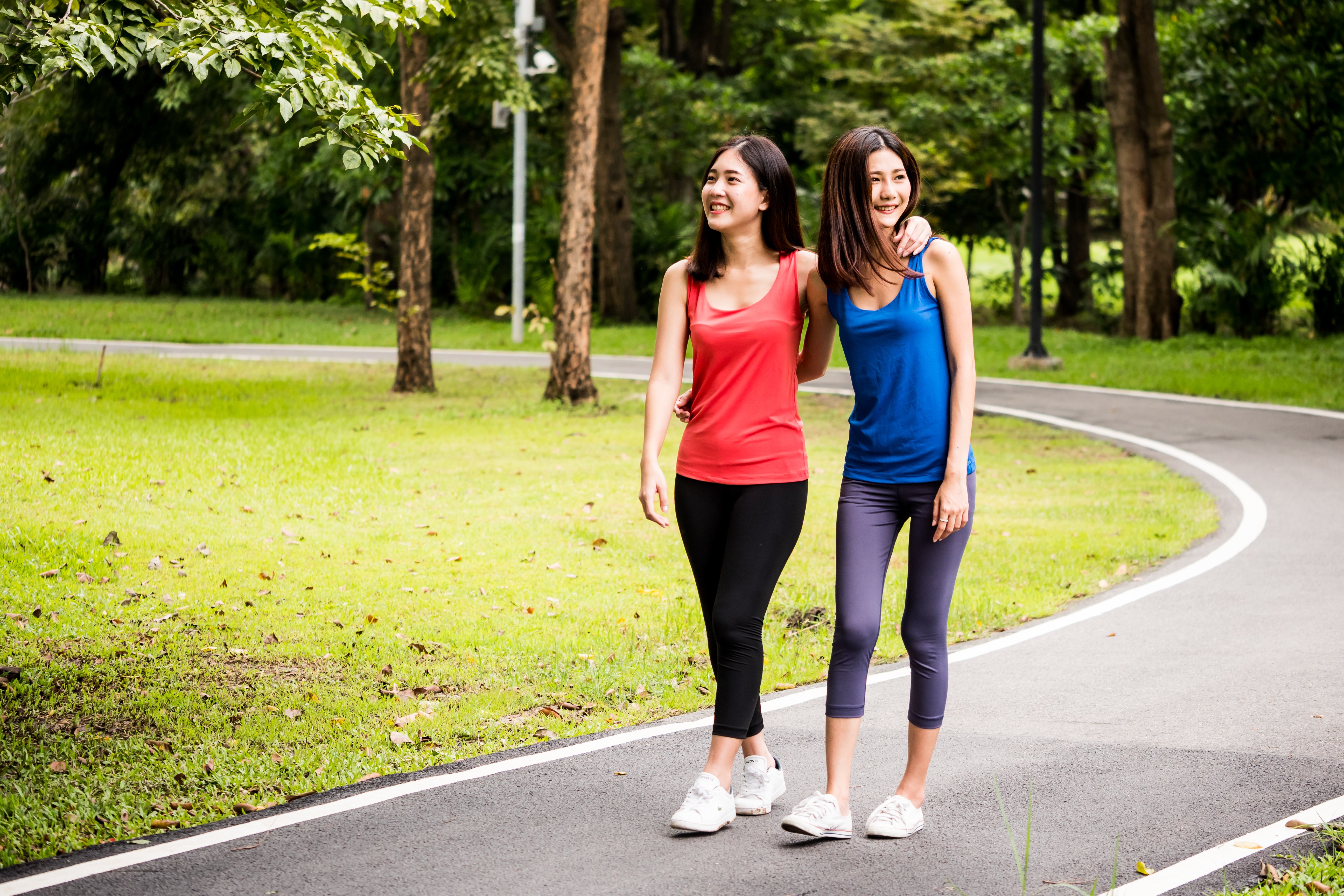 attractive-young-women-walking-after-exercise-in-a-2021-09-04-00-12-30-utc